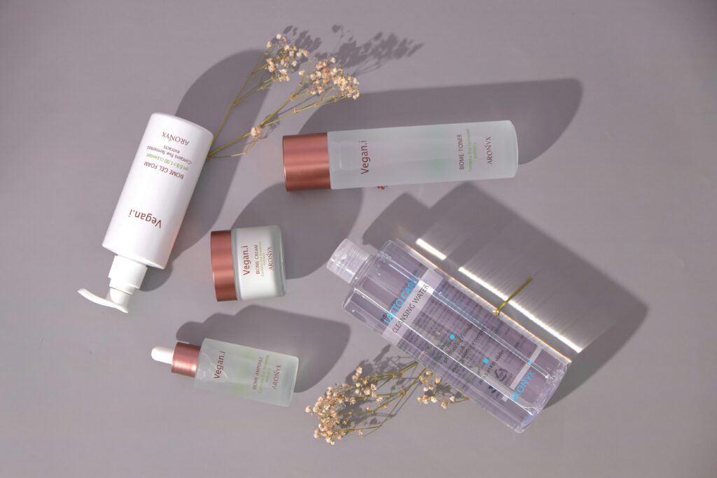 Stylish flat lay of vegan skincare products with a minimalist design.
